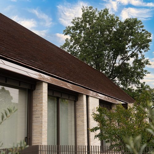 Armadale. Matte gloss Geoshine™. White quartz 95% and basalt 5% in half white oxide with off white cement.
